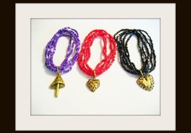 send you a stretch bracelet made of five strands of seed and bugle beads with a cute goldtone charm, US addresses only, big2