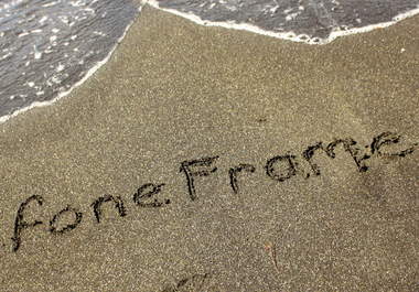 write your name/business name/message in the sand, at a black sand beach and photograph it big2