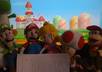 take a photo of the Mario Brothers in front of your logo, website or message small2