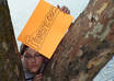 send 3 high resolution photos of me holding a sign to promote your message small2