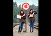 take a multi exposure photo of me holding your message and your logo in traffic signs small3
