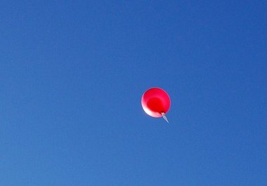 write a message on a tag on a latex helium filled balloon and release it, with photographic evidence which I will send to you big3