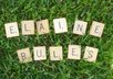 arrange Scrabble tiles to form a message lush, green grass and send you a high res photo small3