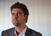 create a professional video testimonial in a suit/without a suit small1