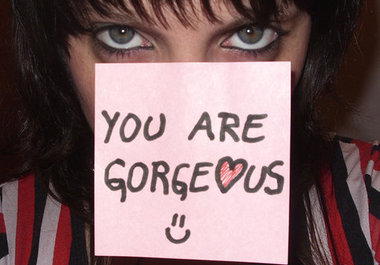 write your ad on a Post-It note, stick it between my Big Blue Eyes, and send you a cool picture of it big1