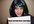 hold a sign saying WHATEVER you want in a wig
