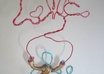 make a small wire person holding a sign or symbol