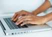 10344602-closeup-of-female-hands-typing-on-laptop-keypad