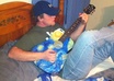 play comedy songs and parodies and happy birthday on guitar