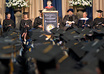 print and distribute flyers at the University of Pittsburgh graduation