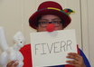 dress up in a clown hat and nose holding a message and send hd pictures small1