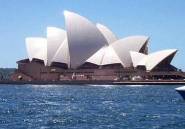 stand in front of the Opera House in Sydney and take a picture with a poster with YOUR NAME on it big1