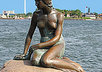 take a picture of the little mermaid While I hold your printed message