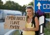 write your website name or any message you want on 4 custom signs that people holding it small1