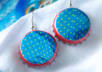 make a custom pair of bottle cap earrings