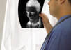 send you a picture of doctor holding your xray film small1