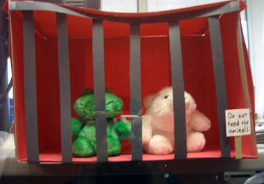 send you a picture of a cute toy behind bars in jail big1