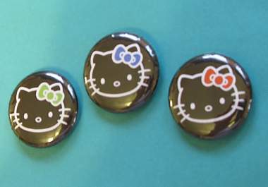 mail you 3 hello kitty buttons big1