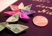 write your name with miniature paper boats