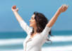6244050-pretty-young-woman-with-arms-raised