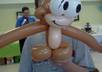 make a balloon animal on video in a funny way and congratulate someone by name on a birthday or other special event
