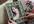 place your image in a photo frame holding by a girl